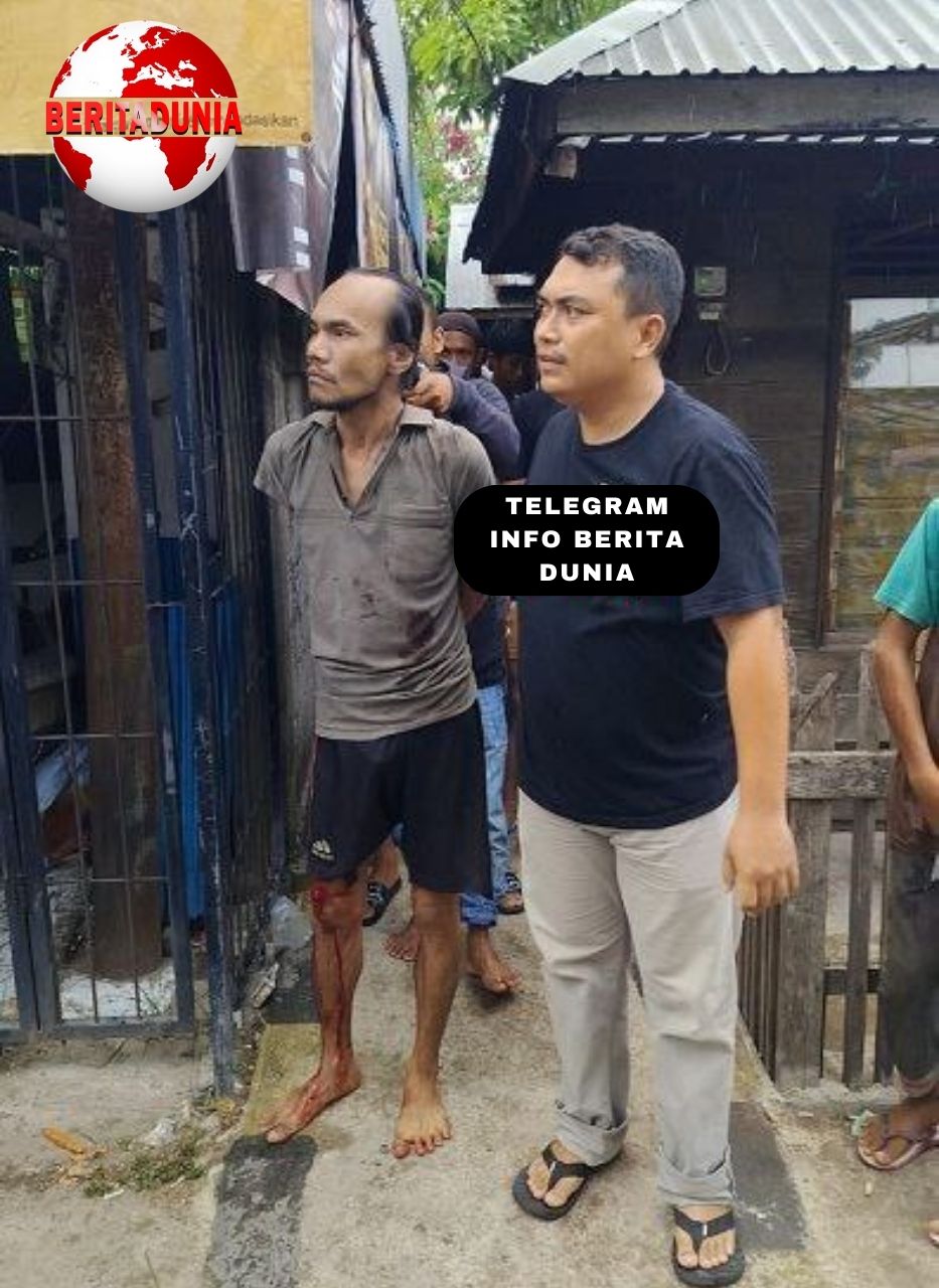 Pria Mengamuk Menggunakan Parang